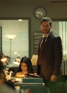On the background, a man and a girl.