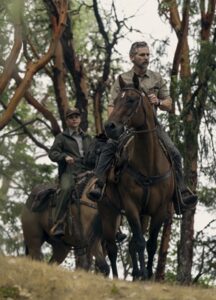 Two park rangers on horseback