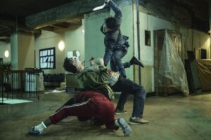 People are fighting against each other