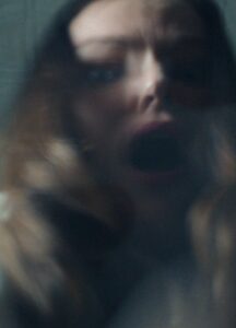 Nicola Hadjis as April Miller in True Haunting.